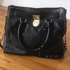 Black and gold Michael Kors purse